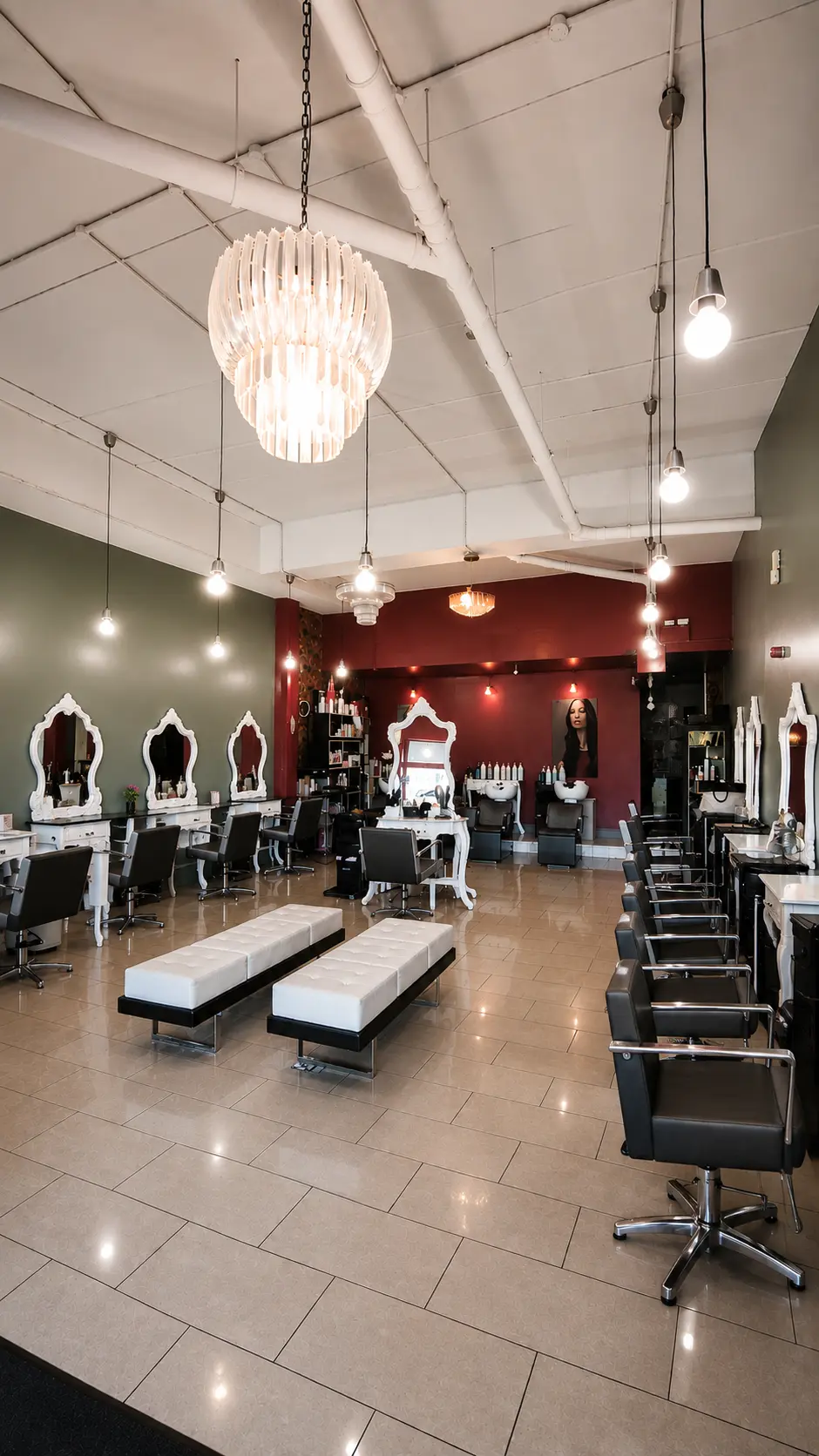 Inside Pamper Yourself: the main salon floor with styling stations and chandeliers